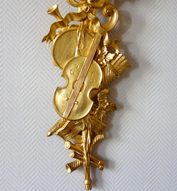 Paire de trophées, ornements de boiseries en bois doré - style Louis XVI - 76cm