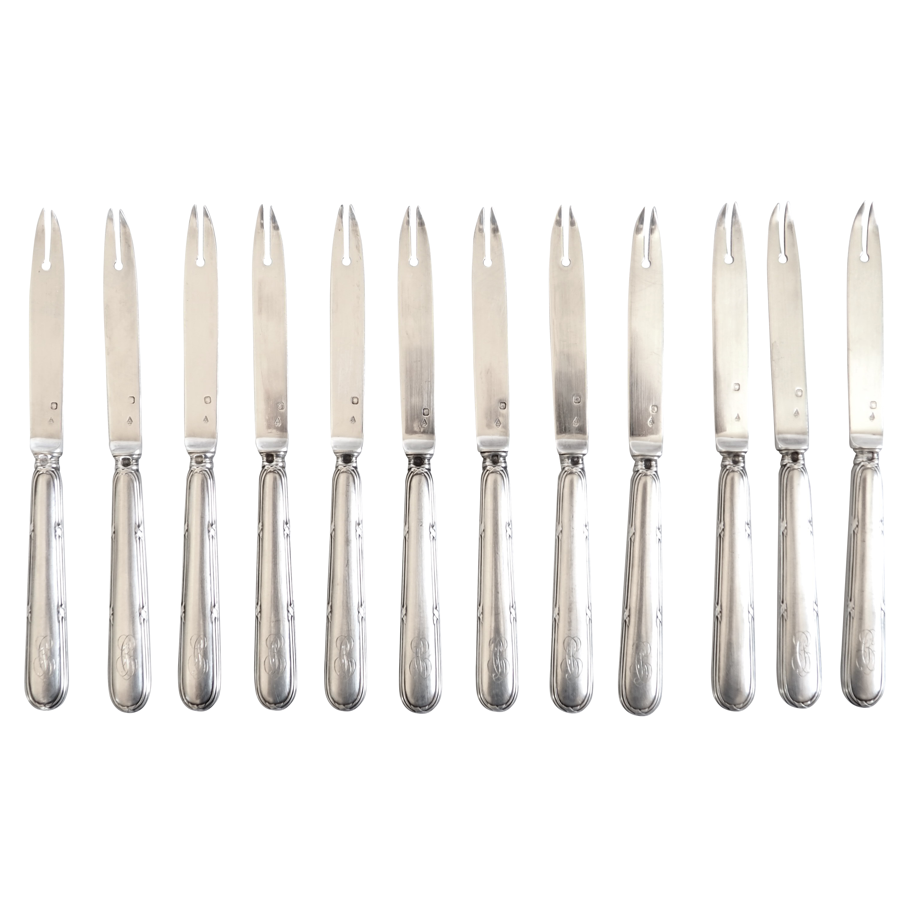 Série de 12 couteaux (fourchettes) à melon en argent massif par Olier & Caron poinçon Minerve