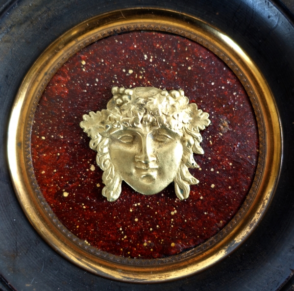 Miniature portrait of Bacchus, ormolu on a porphyry background, 19th century