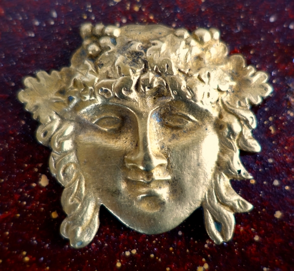 Miniature portrait of Bacchus, ormolu on a porphyry background, 19th century