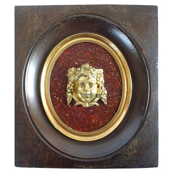 Miniature portrait of Bacchus, ormolu on a porphyry background, 19th century