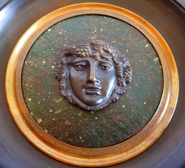 Miniature portrait of Bacchus, patinated bronze on a porphyry background, 19th century
