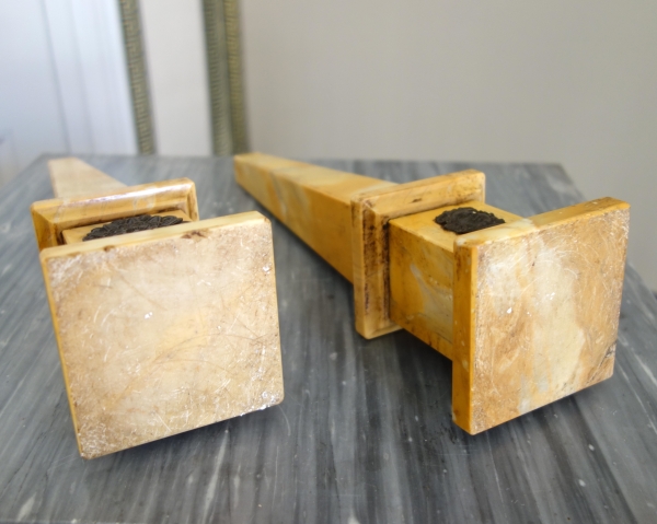 Pair of Sienna marble obelisks, patinated bronze masks - Empire style