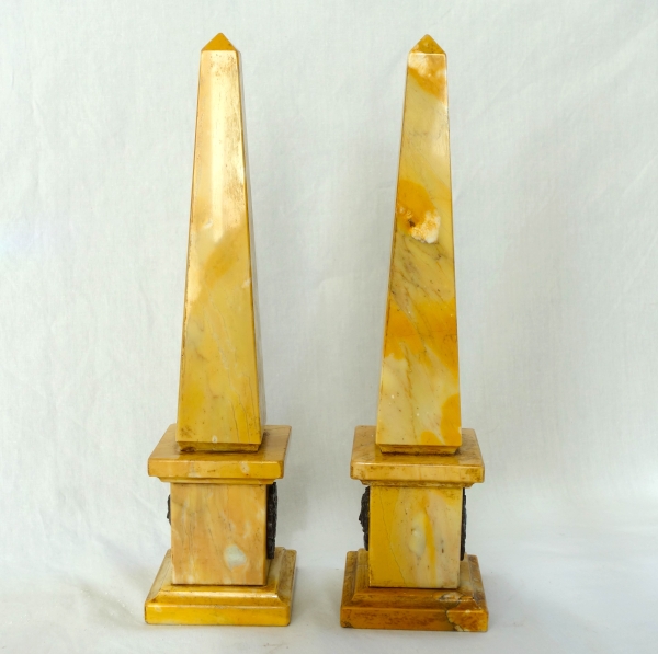 Pair of Sienna marble obelisks, patinated bronze masks - Empire style