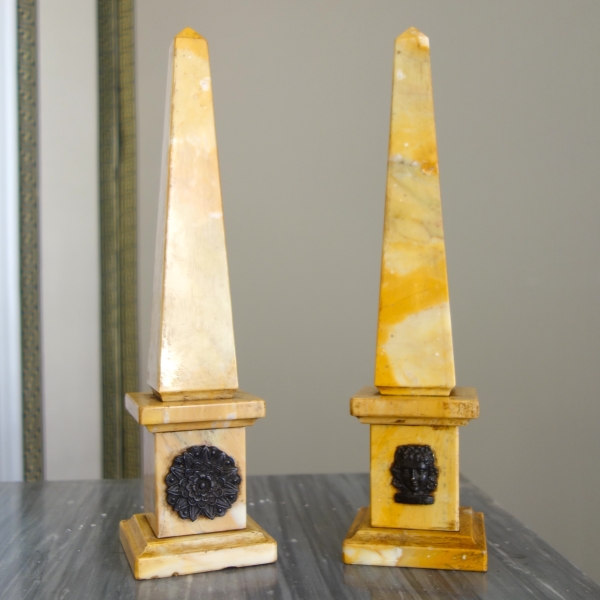 Pair of Sienna marble obelisks, patinated bronze masks - Empire style