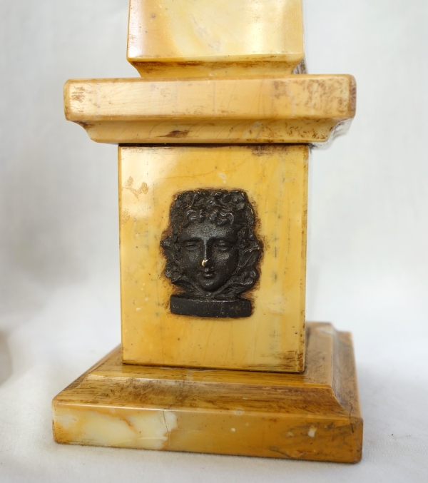 Pair of Sienna marble obelisks, patinated bronze masks - Empire style