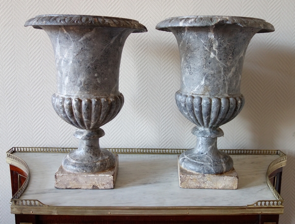Pair of tall painted cast iron vases, 19th century