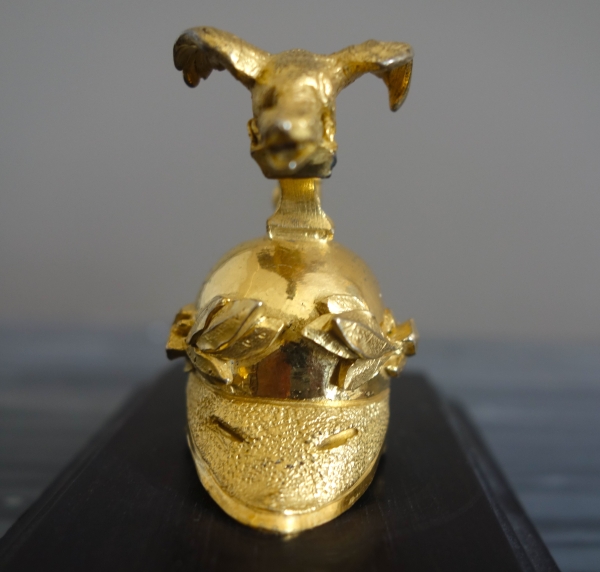 Empire ebony and ormolu paper weight, early 19th century