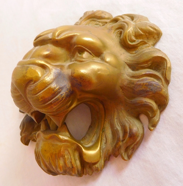 Large chiseled bronze lion head for a fountain, 19th century