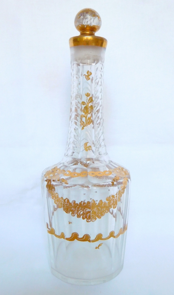 Louis XVI glass liquor bottle enhanced with fine gold, 18th century
