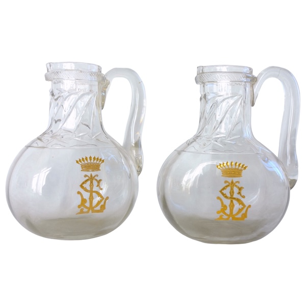 Pair of St Louis crystal water pitchers - Cluny pattern engraved and gilt with a crown of count