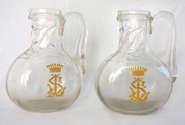 Pair of St Louis crystal water pitchers - Cluny pattern engraved and gilt with a crown of count