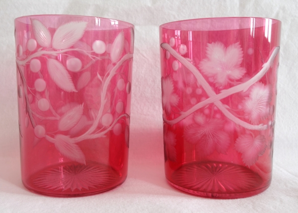 Pair of Baccarat overlay pink crystal glasses, richly engraved model