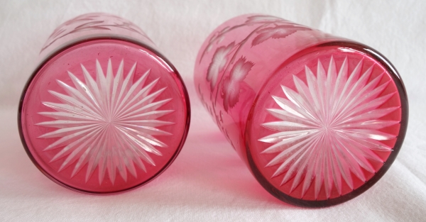 Pair of Baccarat overlay pink crystal glasses, richly engraved model