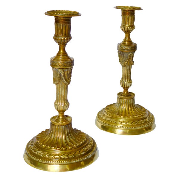 Pair of Louis XVI style bronze candlesticks - mid 19th century