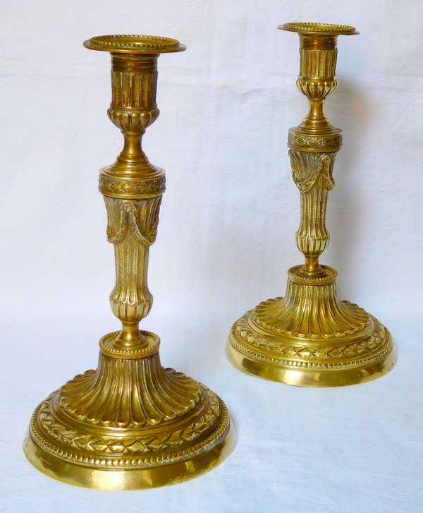 Pair of Louis XVI style bronze candlesticks - mid 19th century
