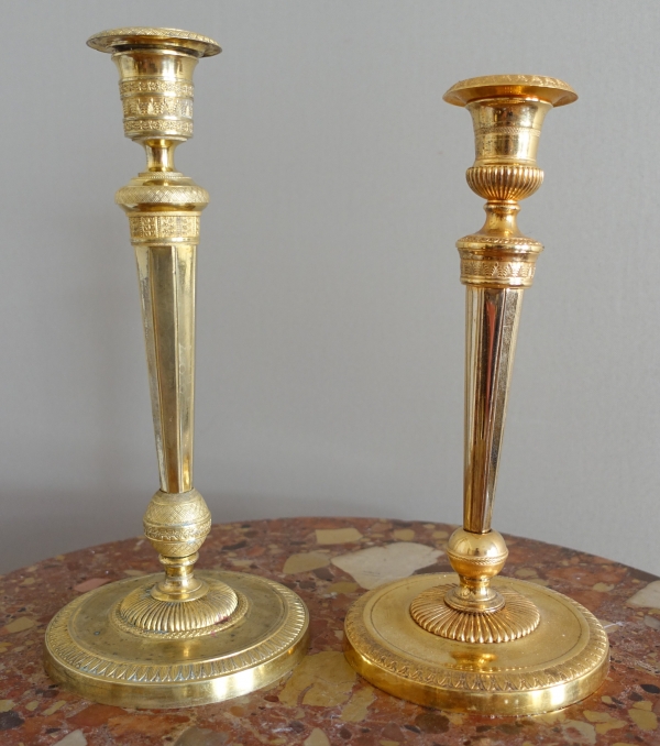 Ravrio : pair of Empire ormolu bronze candlesticks, early 19th century