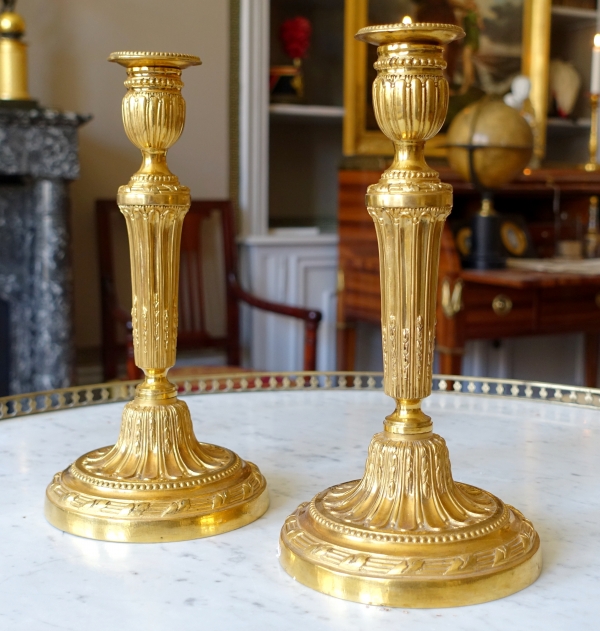 Pair of tall Louis XVI style ormolu candlesticks - 30cm