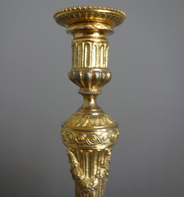 Pair of Louis XVI style ormolu candlesticks - 19th century