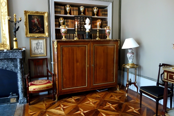 Pair of Louis XVI style ormolu candlesticks - 19th century