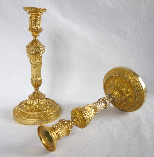 Pair of Louis XVI style ormolu candlesticks - 19th century