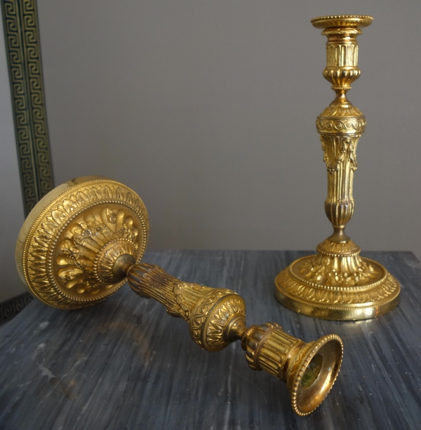Pair of Louis XVI style ormolu candlesticks - 19th century