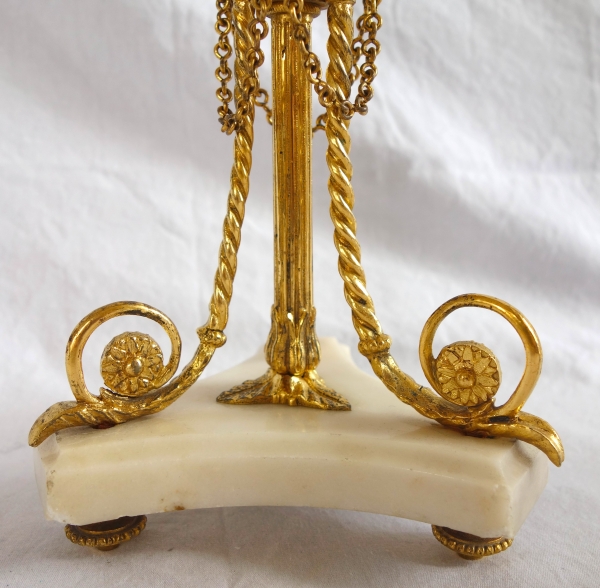 Pair of tripod marble and ormolu Louis XVI style candlesticks