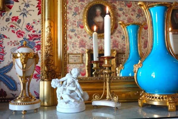 Pair of tripod marble and ormolu Louis XVI style candlesticks