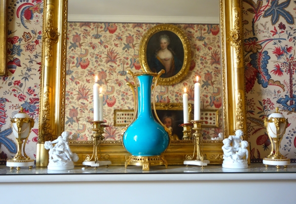 Pair of tripod marble and ormolu Louis XVI style candlesticks