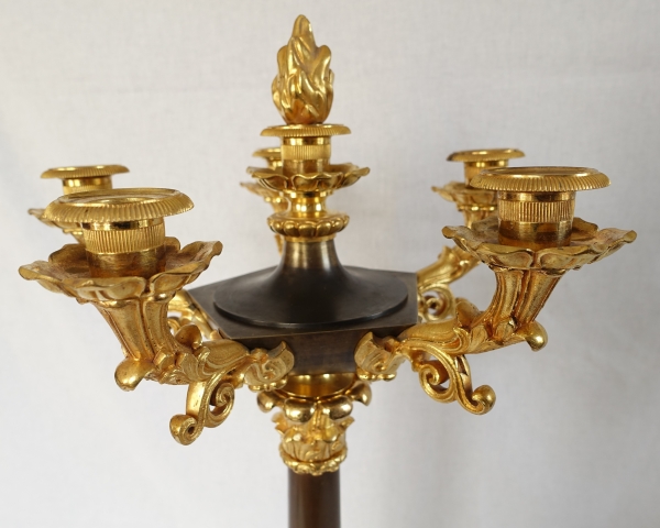 Pair of patinated bronze and ormolu candelabras, early 19th century circa 1830