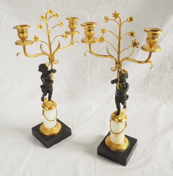 Paire de candélabres en bronze doré et marbre d'époque Empire Restauration