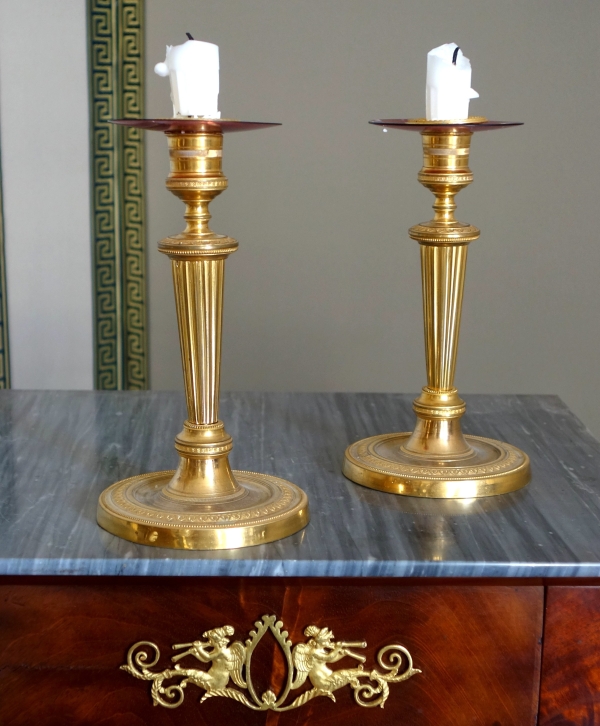 Pair of Louis XVI style ormolu candlesticks, Empire period circa 1800 - 19cm