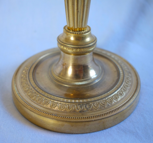 Pair of Louis XVI style ormolu candlesticks, Empire period circa 1800 - 19cm
