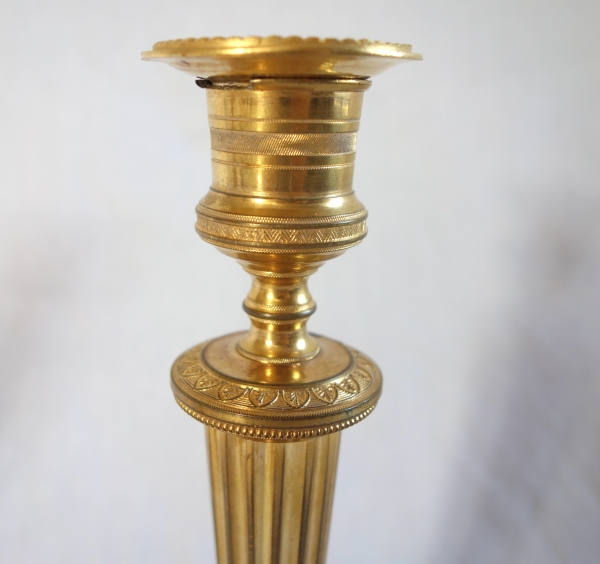 Pair of Louis XVI style ormolu candlesticks, Empire period circa 1800 - 19cm