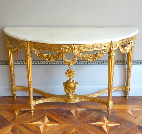 Importante console demi-lune d'époque Louis XVI en bois sculpté et doré - 145cm