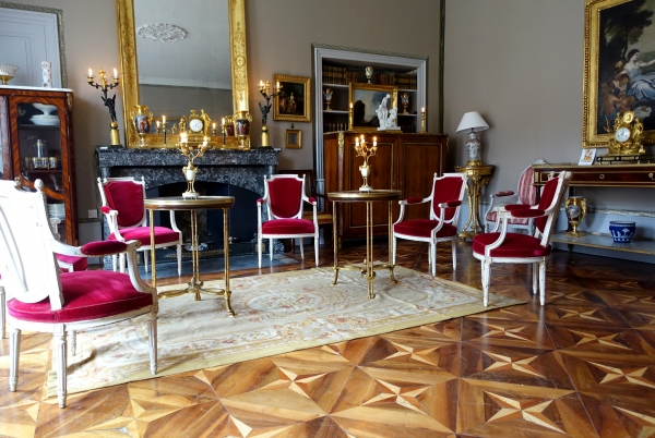 Pair of bronze, marble and mahogany pedestal tables after Weisweiler, Louis XVI style