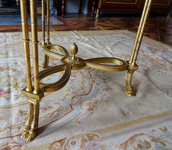 Pair of bronze, marble and mahogany pedestal tables after Weisweiler, Louis XVI style