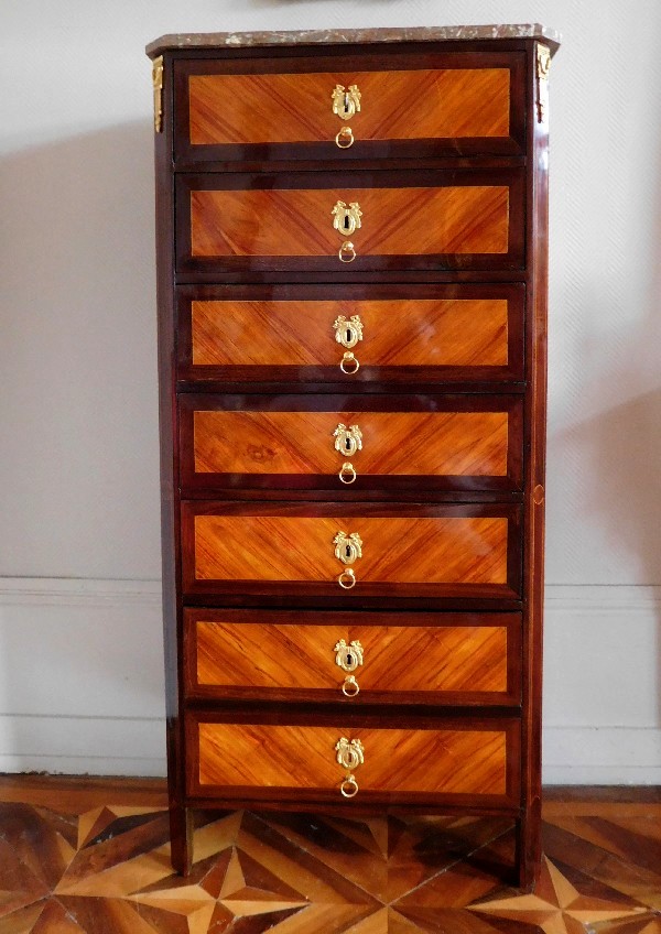 Rosewood and violet Louis XVI semainier, stamped by Dusautoy, 18th century