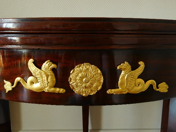 Mahogany Empire half-moon shaped game or card table, ormolu decoration, early 19th century