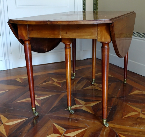 Louis XVI mahogany dinner table, up to 12 guests - early 19th century