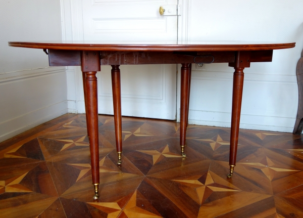 Large Louis XVI solid mahogany dining room table, early 19th century