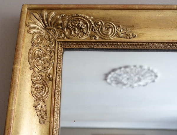 Grand miroir de cheminée Empire en bois doré à l'or fin, glace au mercure - 96cm x 142,5cm