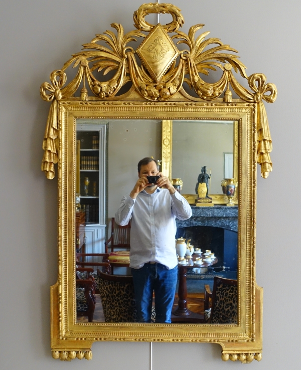 Large gold leaf gilt wood Louis XVI mirror, 18th century