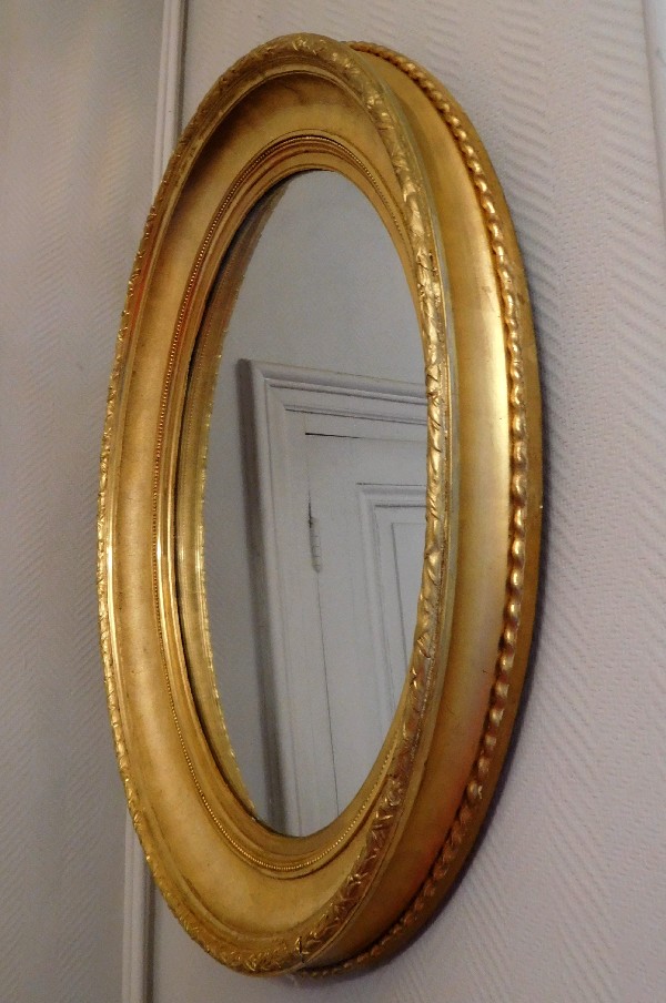 Tall mercury mirror, oval gilt wood frame, 19th century, 82cm x 71cm