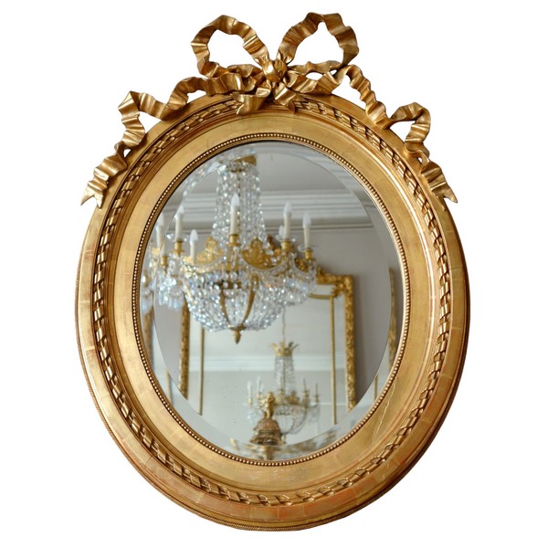 Grand miroir ovale de style Louis XVI en bois doré, époque Napoléon III - 84cm x 63cm