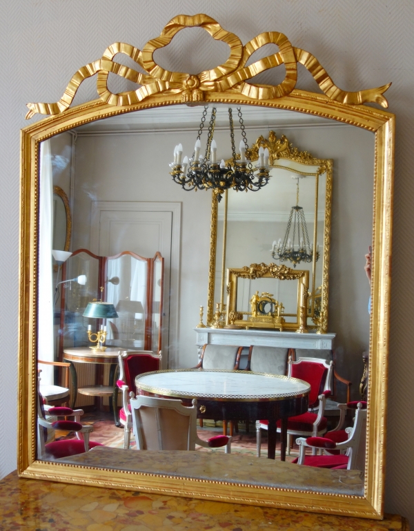 Grand miroir provençal Louis XVI en bois doré et glace au mercure - 143cm x 114,5cm
