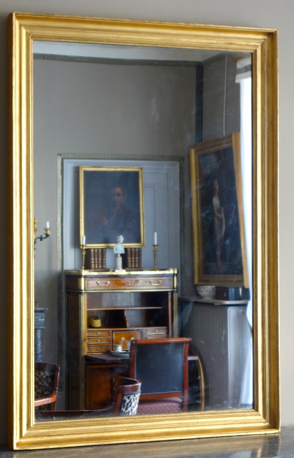 Miroir de cheminée en bois doré à la feuille d'or glace au mercure - 142cm x 97cm