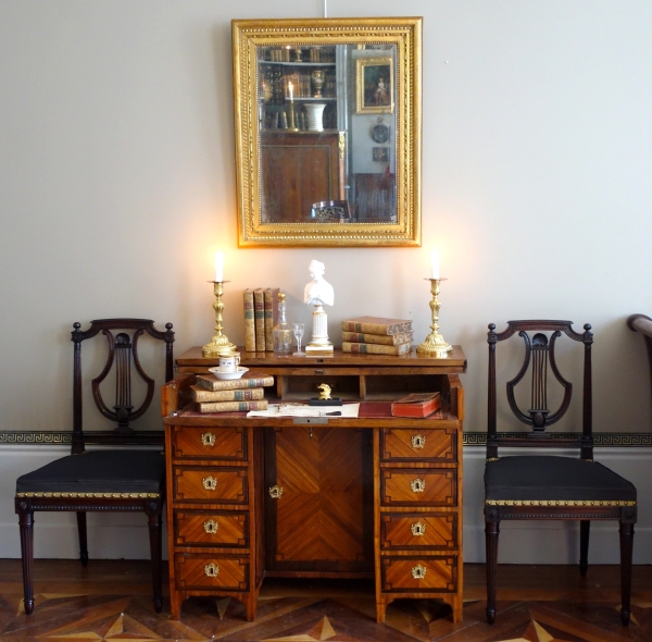 Miroir de boiserie à suspendre en bois doré à la feuille d'or, glace mercure - époque Louis XVI