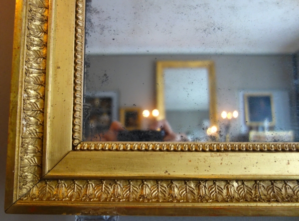Miroir en bois doré feuille d'or et glace au mercure, époque Empire - 88cm x 72cm