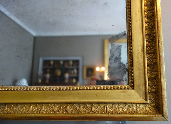 Miroir en bois doré feuille d'or et glace au mercure, époque Empire - 88cm x 72cm